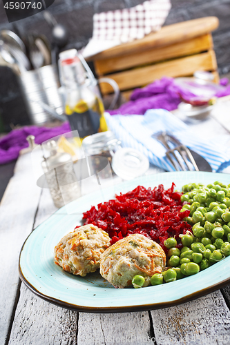 Image of cutlets with peas