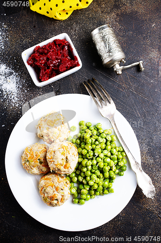 Image of cutlets with peas