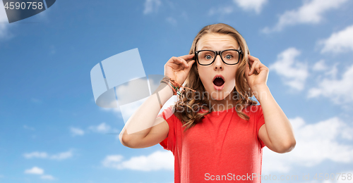 Image of surprised or shocked teenage girl in glasses