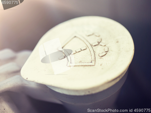 Image of washer tank cap in car