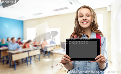 Image of student girl with school bag and tablet computer