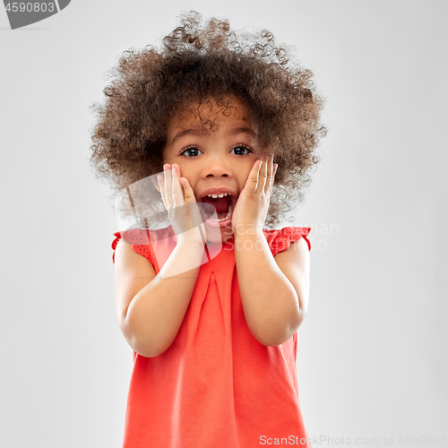 Image of surprised or scared little african american girl