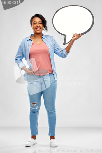 Image of happy african american woman holding speech bubble