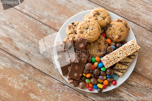 Image of chocolate, cookies, candies and muesli bars