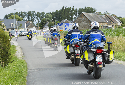 Image of Row of French Policemen on Bikes - Tour de France 2016