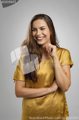 Image of Beautiful brunete woman laughing