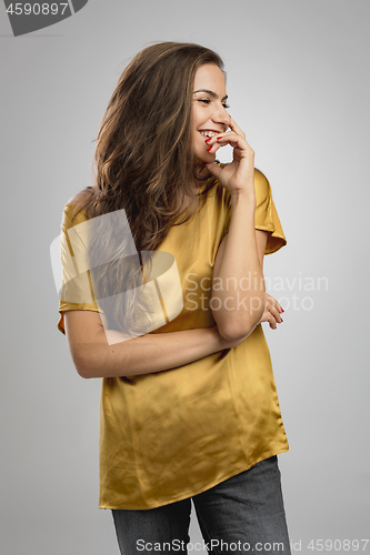 Image of Beautiful brunete woman laughing