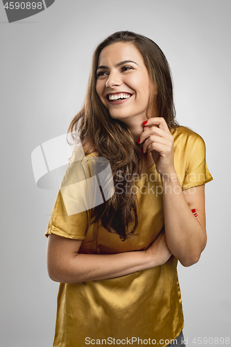 Image of Beautiful brunete woman laughing