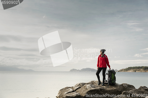 Image of Woman exploring the coast