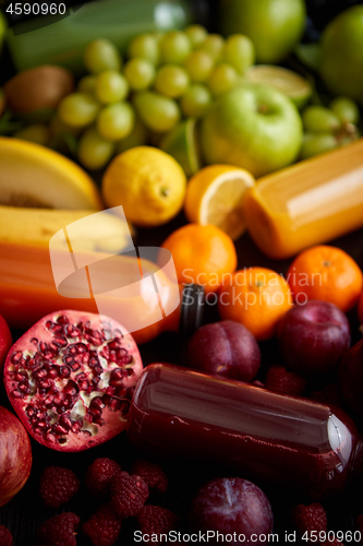 Image of Healthy food concept. Various mixed fruits, vegetables and juices formed in rainbow