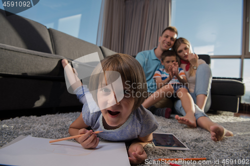 Image of young couple spending time with kids