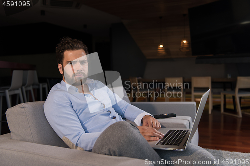 Image of man working from home