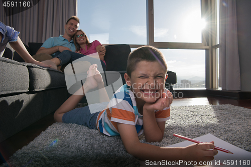 Image of young couple spending time with kids