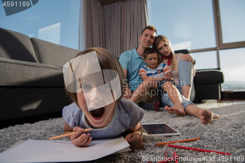 Image of young couple spending time with kids