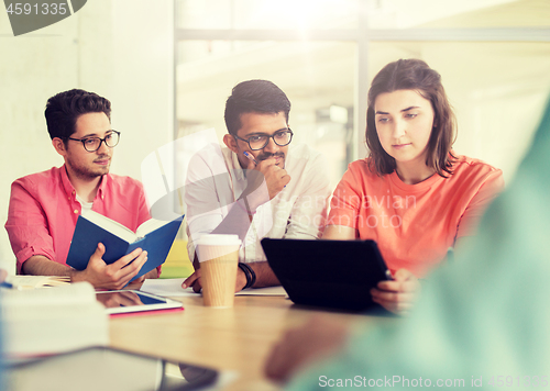 Image of group of high school students with tablet pc