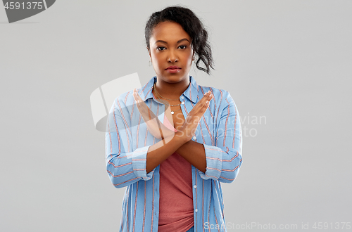 Image of african american woman over grey background