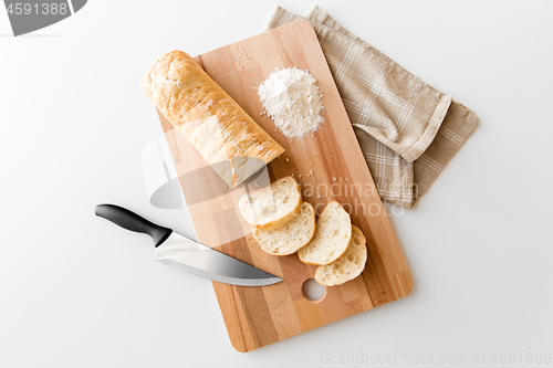 Image of close up of white ciabatta bread on cutting board