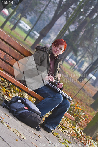 Image of Lonely girl in a park