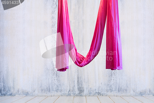 Image of Pink hanging hammock indoor