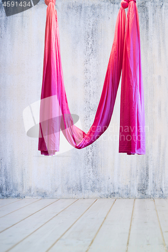 Image of Pink hanging hammock indoor