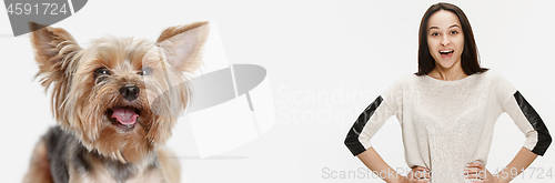 Image of Woman with her dog on leash over white background