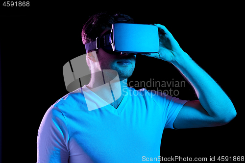 Image of man in virtual reality headset or vr glasses