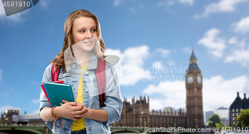 Image of happy smiling teenage student girl with school bag