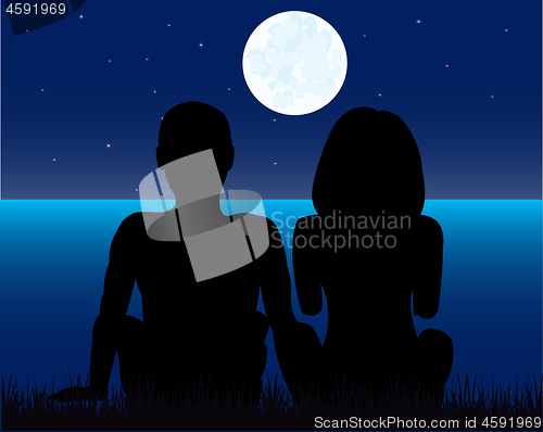 Image of Man and woman moon in the night beside water