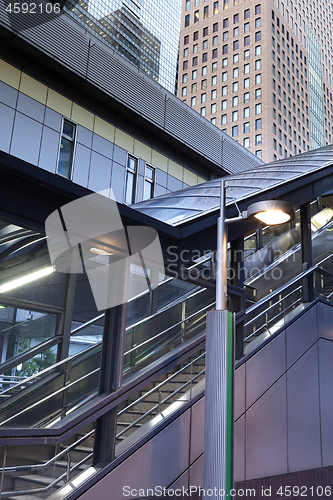 Image of Modern architecture - Futuristic city view on stairs decorated with shiny steel plates