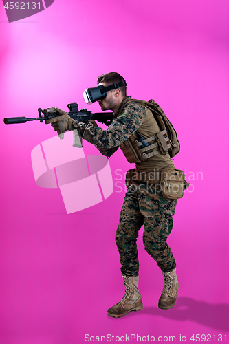 Image of soldier in battle using virtual reality glasses