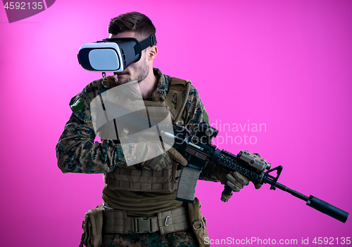 Image of soldier in battle using virtual reality glasses