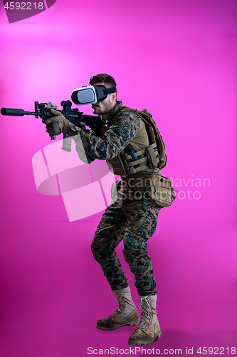 Image of soldier in battle using virtual reality glasses