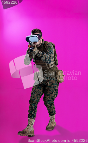 Image of soldier in battle using virtual reality glasses