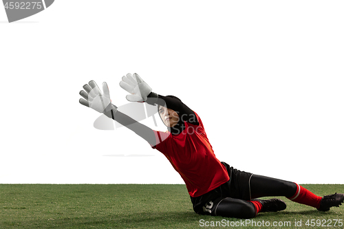 Image of Arabian female soccer or football player, goalkeeper on white studio background