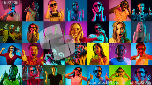 Image of Portrait of multiethnic group on multicolored background in neon light