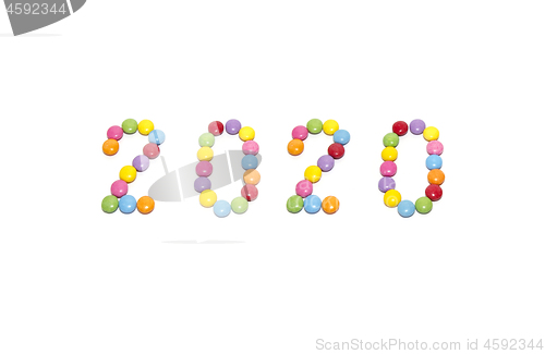 Image of "New Year 2020" from multicolored sweets candy