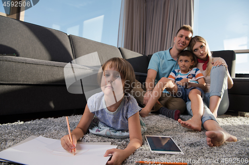 Image of young couple spending time with kids