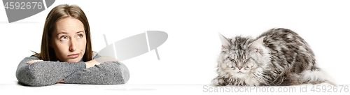 Image of Woman with her cat over white background