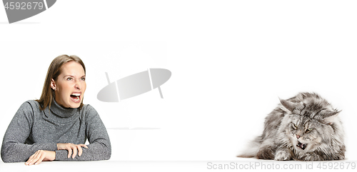 Image of Woman with her cat over white background
