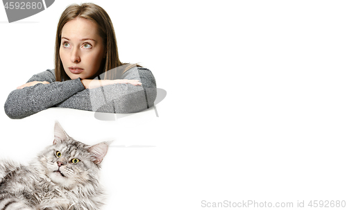 Image of Woman with her cat over white background