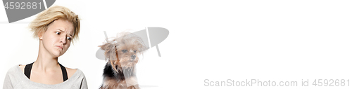 Image of Woman with her dog on leash over white background