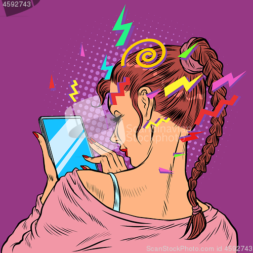 Image of A young woman with a smartphone. Techniques and gadgets