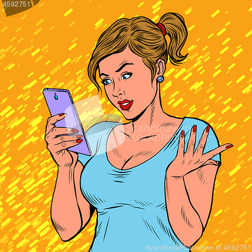 Image of A young woman with a smartphone. Techniques and gadgets