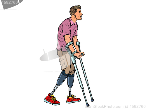 Image of legless veteran with a bionic prosthesis with crutches. a disabled man learns to walk after an injury. rehabilitation treatment and recovery