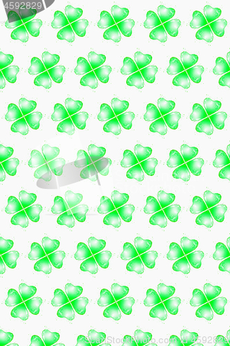 Image of Vertical holiday pattern from splashes of clover leaves.