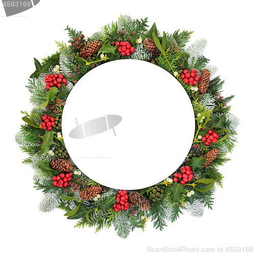 Image of Christmas Table Setting with Winter Greenery 