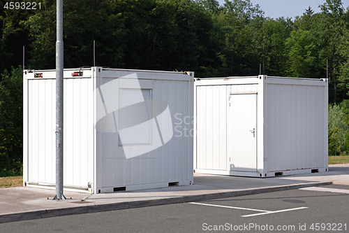 Image of Two White Containers