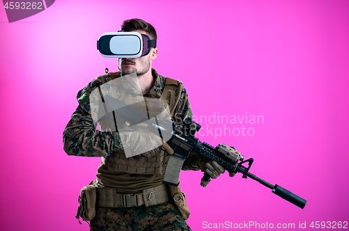 Image of soldier in battle using virtual reality glasses