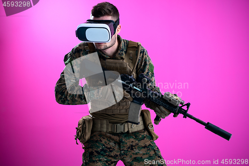 Image of soldier in battle using virtual reality glasses