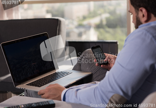 Image of man working from home